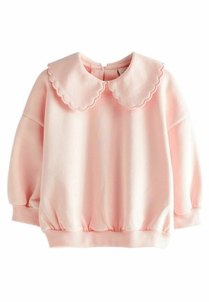 Sweat-shirt rose à col festonné, poignets côtelés et bas élastiqué. Confectionné dans un tissu doux et texturé. Fermeture éclair au dos.