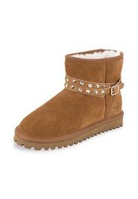 Bruine suède enkelboot met een fluffy voering, een gestikte band rond het midden en een gestructureerde rubberen zool.