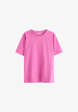 T-shirt di cotone rosa con maniche corte, scollatura rotonda e texture liscia. Non sono visibili motivi o decorazioni.