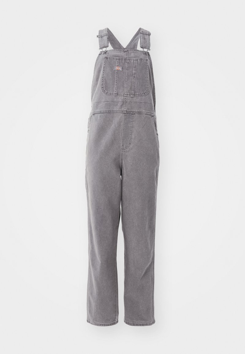 Graue Denim-Overalls mit verstellbaren Trägern, einer Brusttasche und einer lockeren Passform. Sie verfügen über gerade geschnittene Beine und eine durchgehende unifarbene Gestaltung.
