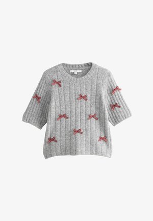 Pilkas megztinis trumpomis rankovėmis su ribine tekstūra, visame paviršiuje puoštas raudonų languotų kaspinų aplikacijomis.