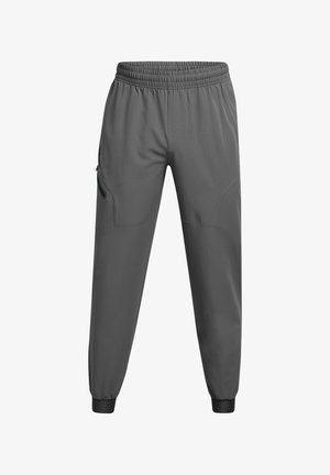 Pantalons de sport gris en tissu lisse et léger. Caractéristiques : taille élastique, coupe slim, chevilles côtelées et poches zippées sur les côtés.