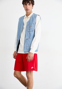 Nike Sportswear Pantaloni de trening - university red/white