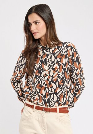 Long-sleeve button-up shirt featuring a black base with abstract leaf patterns in orange, cream, and light brown. Soft fabric with a collared neckline.