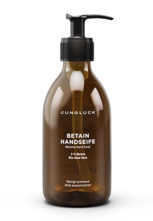 Brown pump bottle of Jungluck Betain Hand Soap with 3% betain and bio-aloe vera, labeled in German and English.