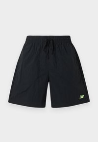 Μαύρο αθλητικό σορτς με ελαστική μέση και κορδόνι, με μικρό πράσινο λογότυπο New Balance στο κάτω αριστερό πόδι.