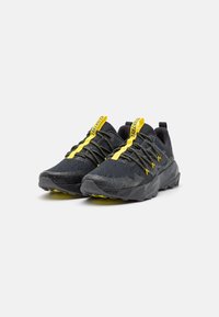 New Balance TEKTREL - Trail running shoes - black