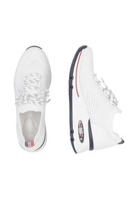 White athletic shoes with a breathable mesh upper, lace-up design, and contrasting navy sole. Features a visible air cushioning unit.