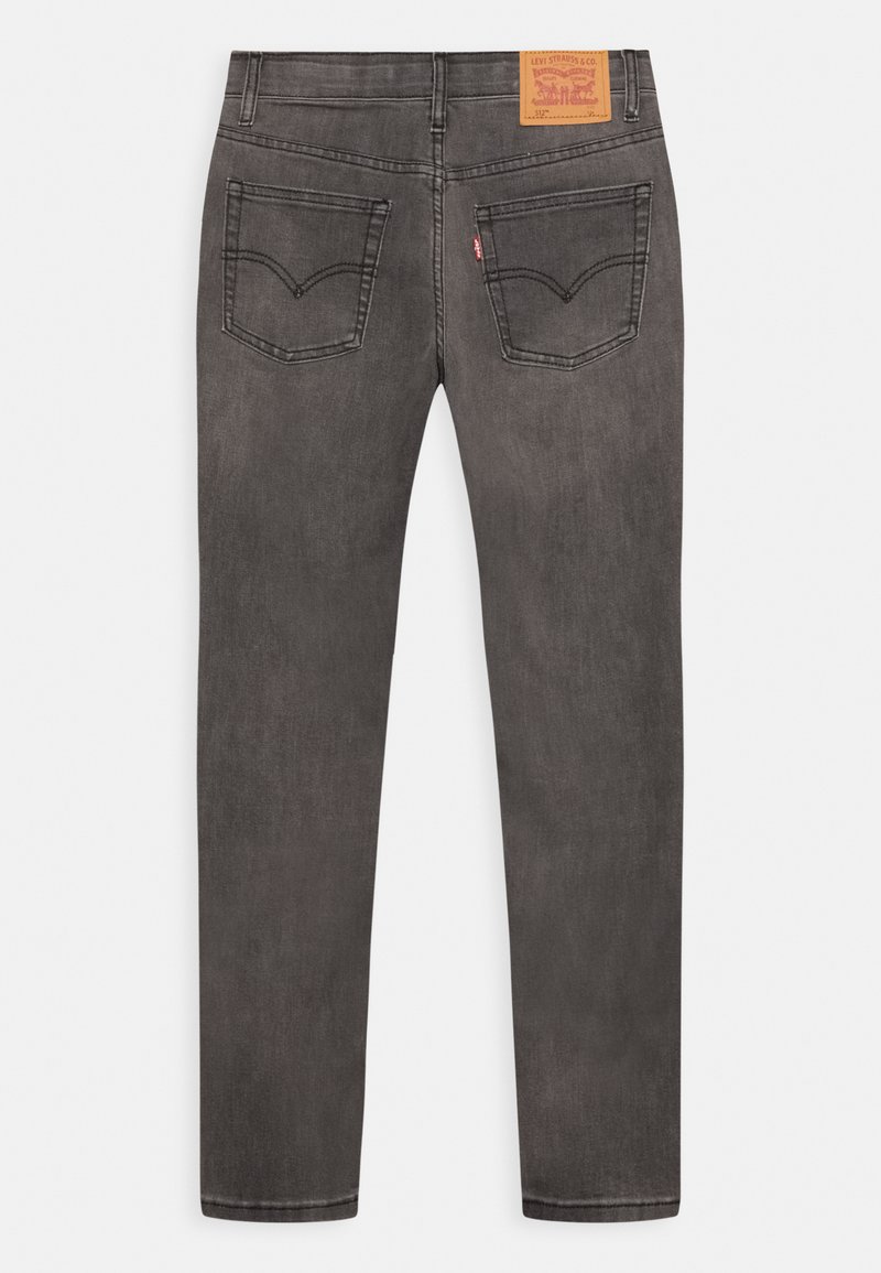Graue Jeans aus Denim mit schmalem Schnitt, fünf Taschen, dezenten Nähdetails und einem Lederpatch am Bund mit Markenlogo.