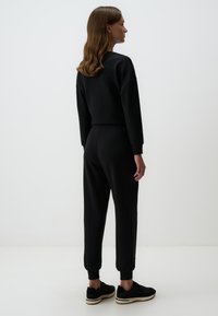 Jimmy Key HIGH WAIST JOGGER  - Trainingsbroek - black