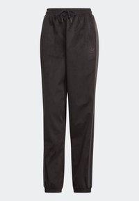 Pantalones de pana negros con cintura elástica y cordón, piernas estrechas y dos franjas laterales. Presentan una textura acanalada y un sutil logo en la parte delantera.