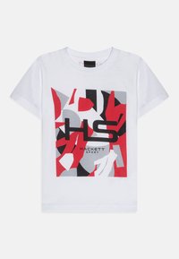 White cotton t-shirt featuring a colorful abstract print in red, black, and gray. Includes the text "HACKETT SPORT" and logo in the center.