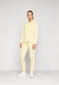 adidas Sportswear ESSENTIALS 3-STRIPES - Treniņtērps - almost yellow/white