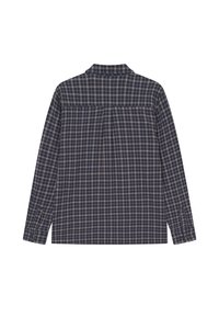 Hosszú ujjú, gombos ing, tengerészkék kockás mintával, bézs és fehér akcentusokkal, valamint egy yoke részlettel a hátsó részen.