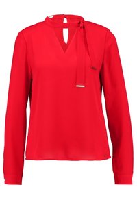Röd långärmad blus med V-halsringning och dekorativ knytning. Tillverkad av slät tyg, med en bakre nyckelhålsöppning och minimala detaljer.