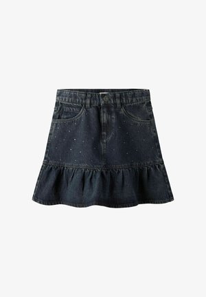 Denim skirt in dark wash with a flared, ruffled hem. Features decorative studs on the front and two front pockets.