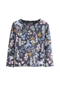 Pitkähihainen paita laivastonsinisestä resorikankaasta, jossa on kukkakuvio, sinisiä yksisarvisia ja aaltoileva helma. Paidassa on painettu tuotemerkki sisäpuolella.