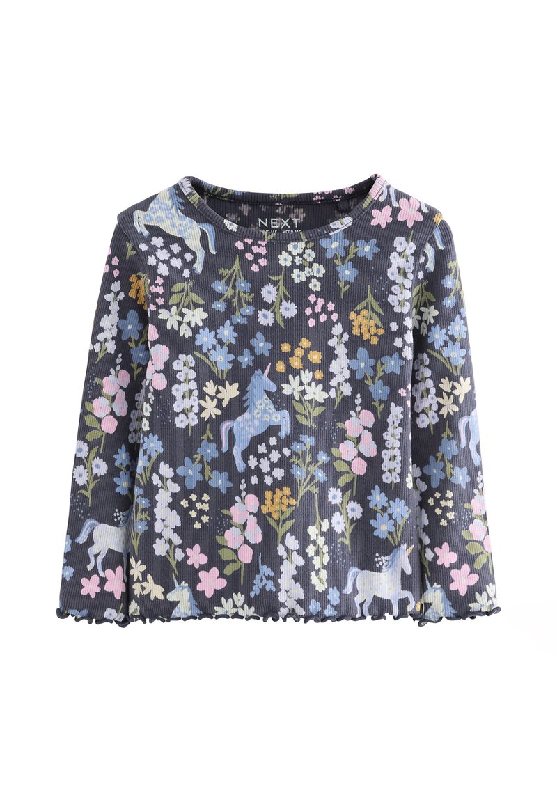 Pitkähihainen paita laivastonsinisestä resorikankaasta, jossa on kukkakuvio, sinisiä yksisarvisia ja aaltoileva helma. Paidassa on painettu tuotemerkki sisäpuolella.