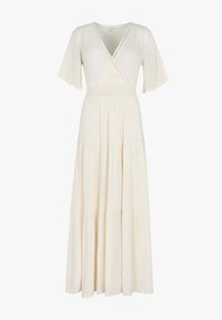 Robe maxi en crème, avec un décolleté en V, des manches courtes volantées, et une taille ajustée avec une texture froncée, menant à une jupe fluide à volants.