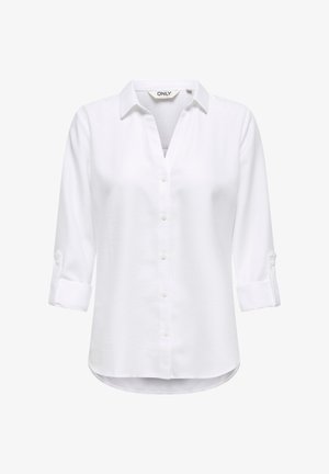 White button-up shirt with a collar, long sleeves rolled at the cuffs, and a smooth texture. Features a curved hem and front placket.