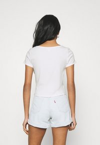 Monki QUINNY TOP 2 PACK - T-shirt estampada - yellow medium dusty/white