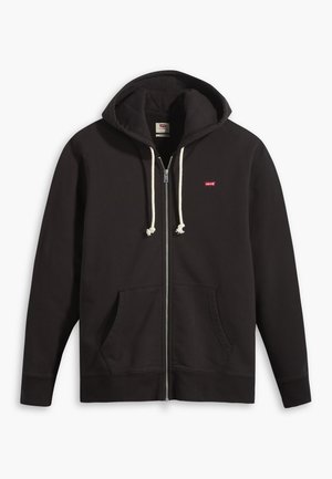 Svart zip-up hettegenser laget av bomullsblanding, med foret hette, kremsnorer, frontlommer og en liten rød logo på brystet.