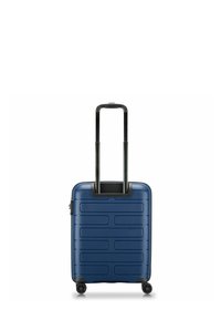 Valigia rigida blu navy con un motivo a strisce testurizzate, manico retrattile nero e quattro ruote per la manovrabilità.