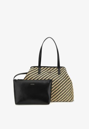 Mustra mustriga mustekotiga, millel on mustad nahast detailid ja käepidemed ning väiksem must kott, millel on tõmblukk.