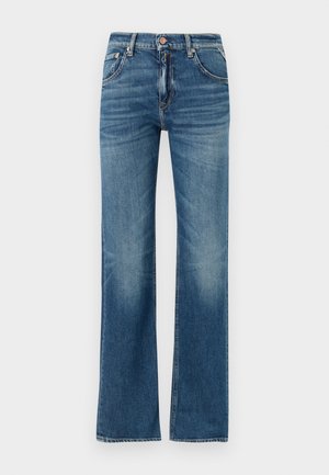 Helles blaues Denim mit hoher Taille, ausgestellt geschnittenen Beinen und subtilen Gebrauchsspuren, ausgestattet mit fünf Taschen und einem Knopfverschluss.