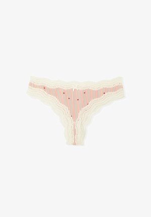 Lace-trimmed thong made of cream fabric with red vertical stripes and small red hearts, featuring a scalloped edge and bow detail.