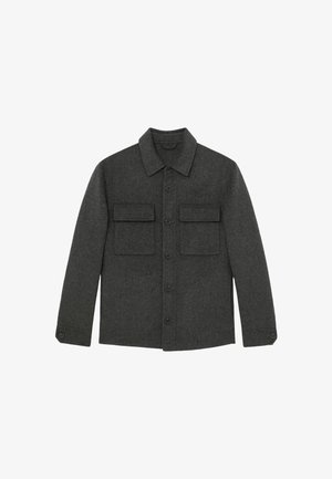 Tumehall villane jakk kraega kaelusega, nööpkinnitusega ja kahe rinnataskuga ees. Sile tekstuur ja kohandatud lõige.