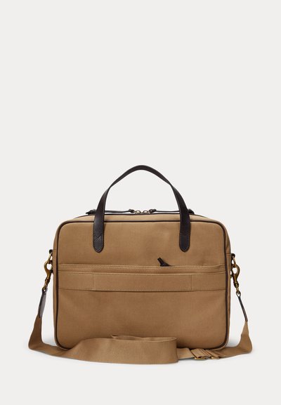 Tan rectangular briefcase with black leather handles, front zipper pocket, and adjustable shoulder strap against a plain white background.