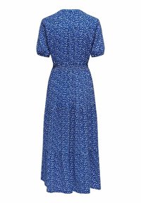 Sininen kukkakuosiset mekko, jossa on lyhyet puffihihat, istuva vyötärö ja soljuva helma. Ominaisuuksiin kuuluu V-pääntie ja kerroksellinen helma.