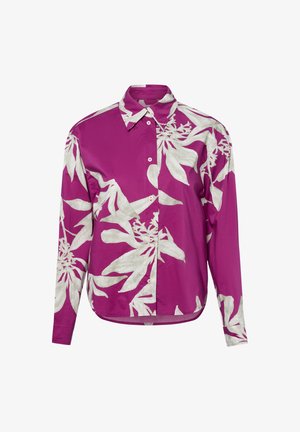 Button-up shirt featuring a vibrant magenta background with large white floral patterns, long sleeves, and a classic collar design.