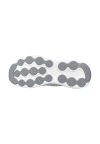 Suela de zapatilla en blanco con detalles en gris claro. Presenta patrones de tracción circulares y una textura suave, con un diseño de perfil redondeado.