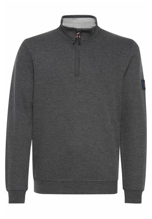 Mörkgrå hoodie med dragkedja i kragen, ribbade muddar och fåll. Har ett litet logopatch på vänster ärm. Mjuk textur.