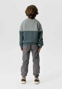 Sissy-Boy JOGGER MIT KORDELZUG - Jeans fuselé - grau