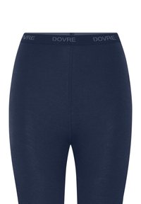 Marineblå leggings lavet af strækstof med en blød tekstur. Har en strikket talje med "DOVRE" subtilt vævet ind.