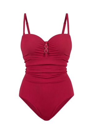 Jednoczęściowy strój kąpielowy w ciemnoróżowym kolorze z regulowanymi ramiączkami, marszczonym stanikiem, dwoma srebrnymi pierścieniami na środku przodu oraz marszczonymi bokami.