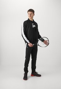 Lacoste Sport TRACKSUIT - Tuta - noir/blanc