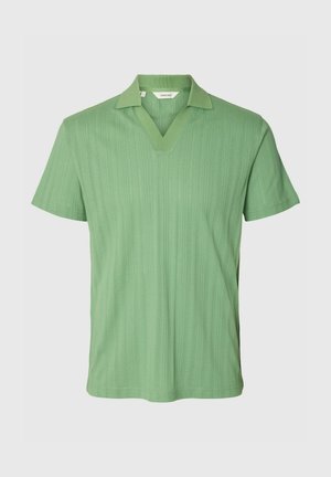 Green short-sleeve knit polo shirt with a textured vertical pattern and open V-neck collar.