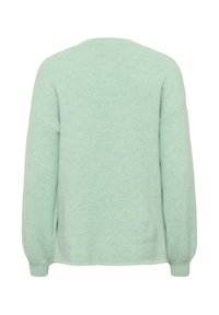 Pull vert menthe à la texture douce, col rond et épaules tombantes. Il possède des manches longues légèrement fuselées et un ourlet droit.
