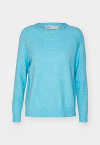 Light blue sweater with a textured finish, ribbed cuffs and hem, and a round neckline. Features raglan sleeves and a relaxed fit.