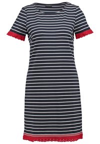 Robe rayée marine et blanche à manches courtes, avec bordure en dentelle rouge aux poignets et à l'ourlet. Encolure ronde, coupe décontractée.