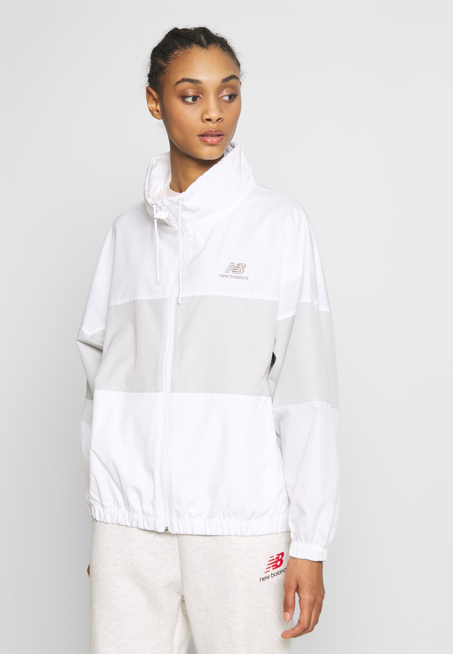 New Balance ATHLETICS WINDBREAKER 