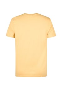 Camiseta de manga corta y cuello redondo en suave algodón amarillo claro. Presenta un diseño simple con una textura suave y costuras limpias.
