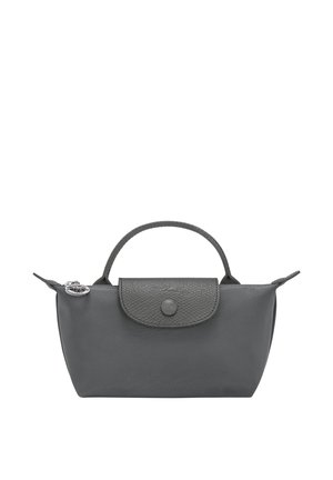 Small gray handbag with single top handle, textured flap with button, and zip closure featuring a round silver charm.