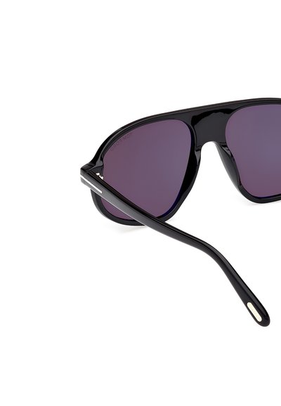 Black plastic sunglasses with dark purple lenses, curved frames, and sleek arms. Features silver-tone accents on the temples.