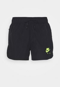 Černé šortky s elastickým pasem a šňůrkou. Na spodní pravé straně se nachází neonově zelené logo Nike a text "AIR".