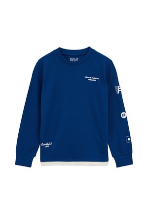 Felpa blu a maniche lunghe realizzata in tessuto testurizzato. Presenta stampe del logo, polsini a coste e un accento bianco all'orlo.